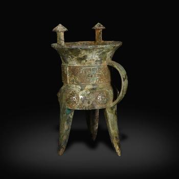 Shang Dynasty Bronze jia ritual vessel with taotie patterns