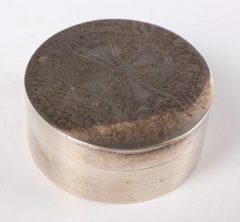 A Victorian silver communion wafer box or pyx, the cover engraved wi