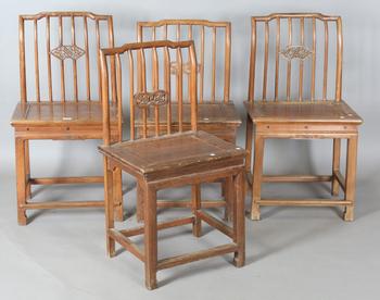 Two pairs of Chinese softwood chairs with carved backs and solid pan