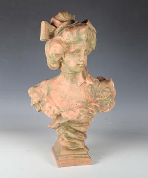 A modern cast composition head and shoulders portrait bust of a youn