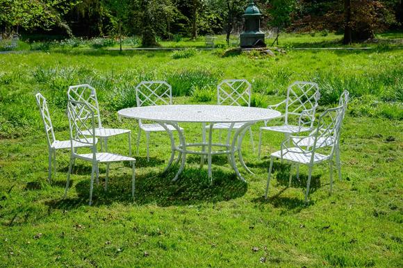 DreweattsA WHITE PAINTED ALUMINIUM FAUX BAMBOO GARDEN SUITE, BY NEWELL, CIRCA 1983