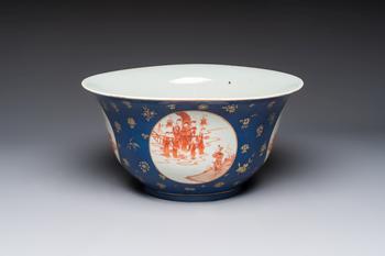 A large Chinese iron-red and gilt-decorated powder-blue-ground bowl with narrative design, 19th C.