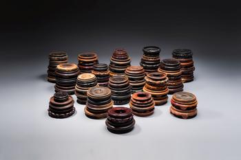 A collection of 75 Chinese wooden stands, 19/20th C.