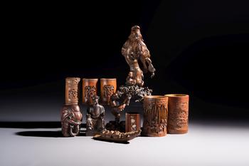 A group of 11 Chinese carved bamboo and wooden works, 19/20th C.