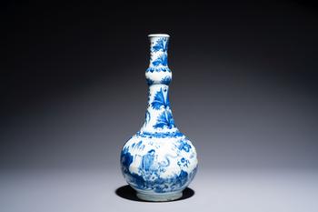 A rare Chinese blue and white bottle vase with narrative design, Transitional period