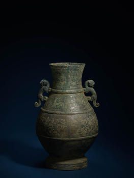 戰(zhàn)國(guó)  青銅狩獵紋龍紋填漆圓壺