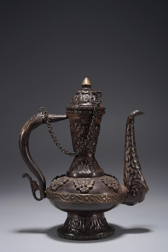 清藏传局部鎏金铜执壶