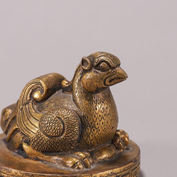 铜鎏金凤鸟纹纸镇