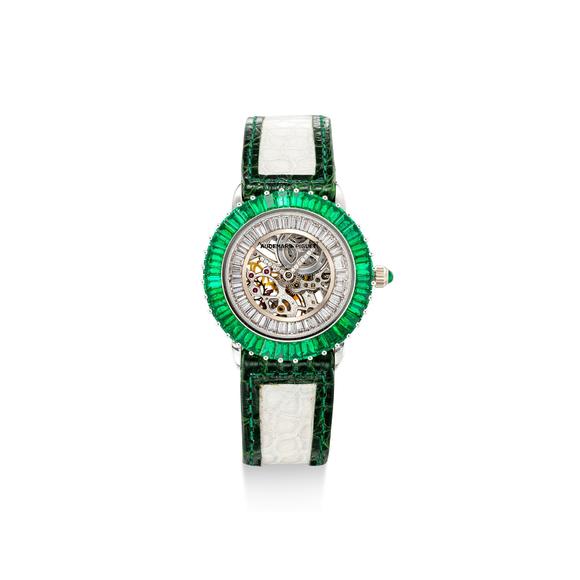 reference 77142bc, a white gold, diamond and emerald-set