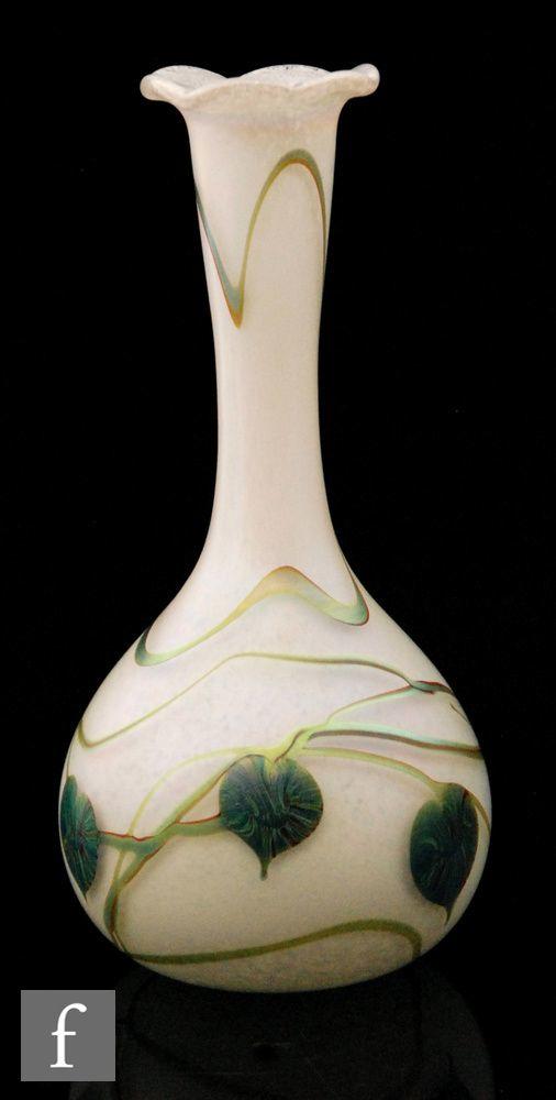 an-okra-hand-blown-glass-vase-of-shouldered-ovoid-form-decorated-with-iridescent-silver-blue