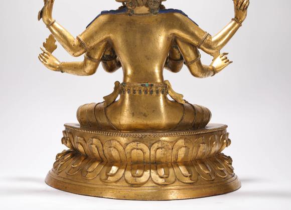 liaodu art auction清代铜鎏金三头六臂佛造像  a bronze gilt three